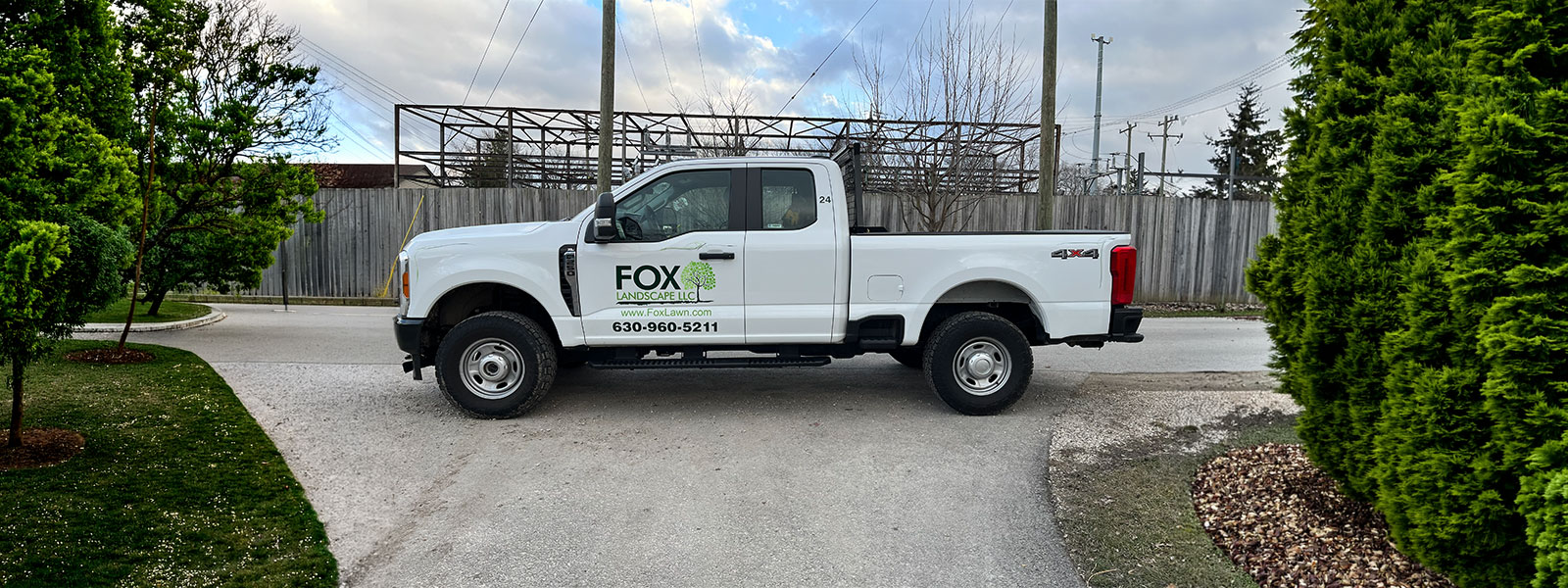 Professionally landscaped garden with mulch beds, ornamental shrubs, and stepping stones in Westmont, IL