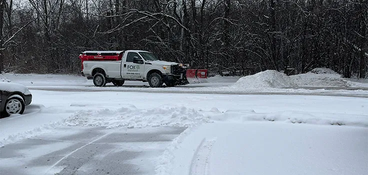 Commercial snow plowing parking lot
