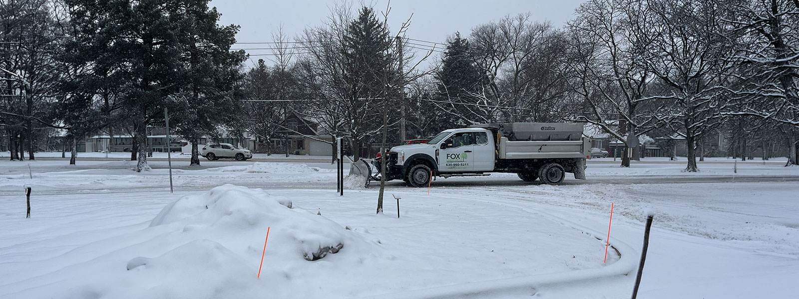 Commercial snow removal plowing truck