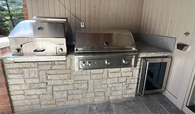 Custom outdoor kitchen with built in gril