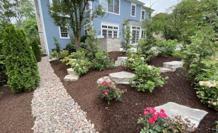 Landscape design - blue home exterior