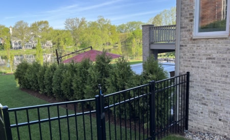 Lawn maintenance and retaining wall