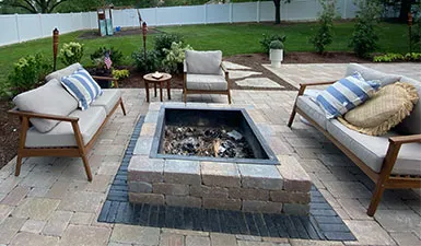 Modern backyard fire pit patio