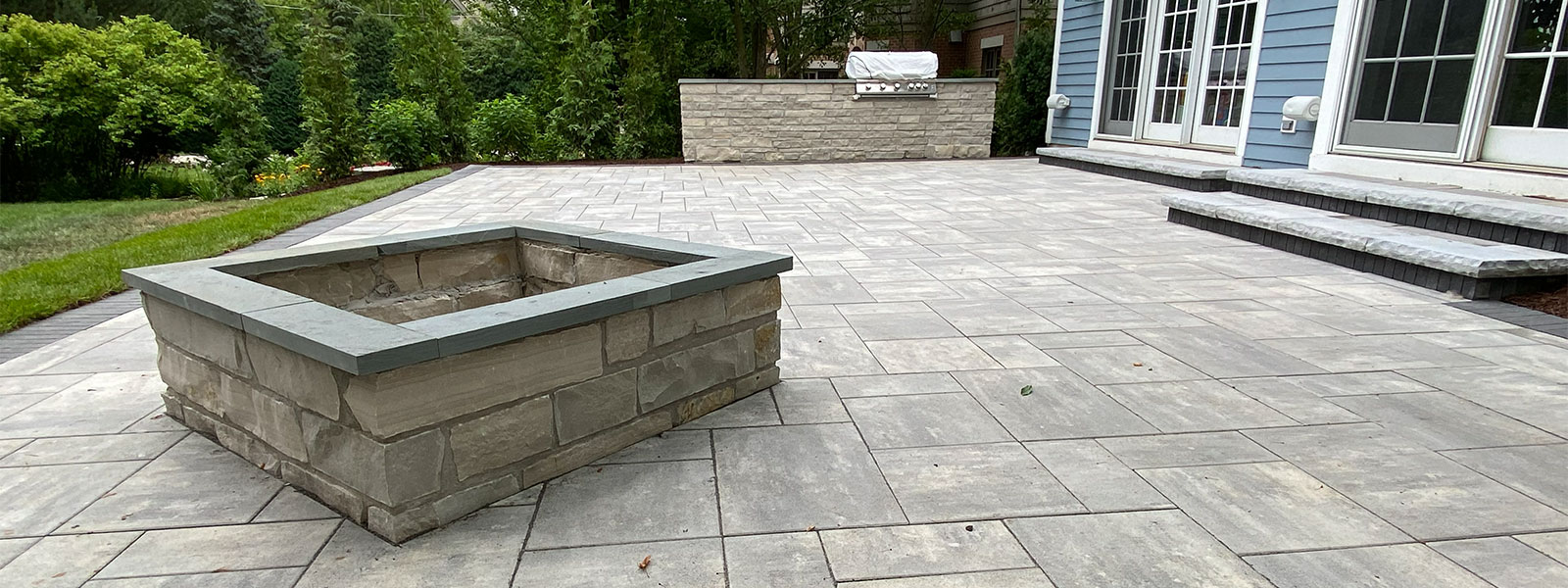 Paver patio installation with fire pit
