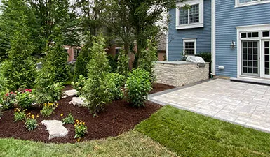Paver patio with outdoor kitchen