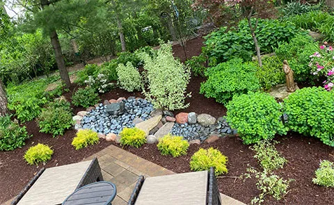 Custom fire feature and fire pit installation in Westmont, IL